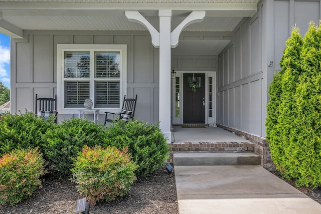 7192 Winfrey Dr, Fairview, TN 37062 - doorway to property with a porch and board and batten siding