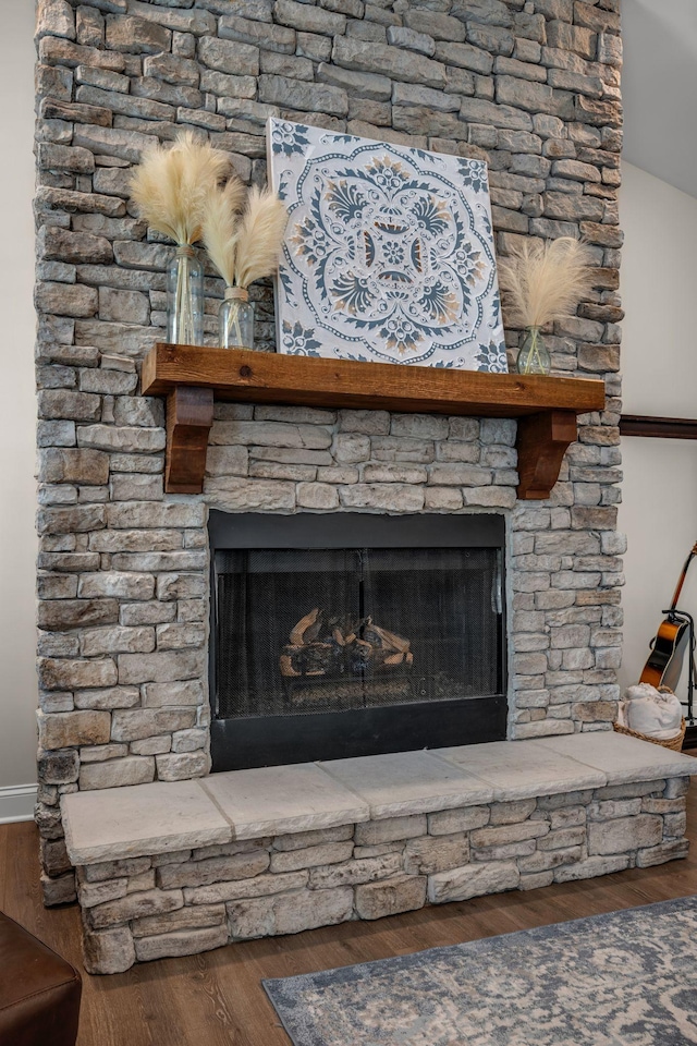 7192 Winfrey Dr, Fairview, TN 37062 - detailed view of a stone fireplace and wood finished floors