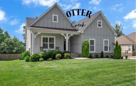 7192 Winfrey Dr, Fairview, TN 37062 - view of front of home with board and batten siding and a porch