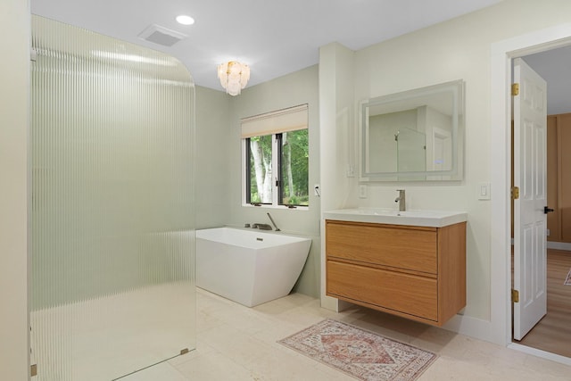 9208 Windstone Dr, Ooltewah, TN 37363 - full bathroom with vanity and a soaking tub