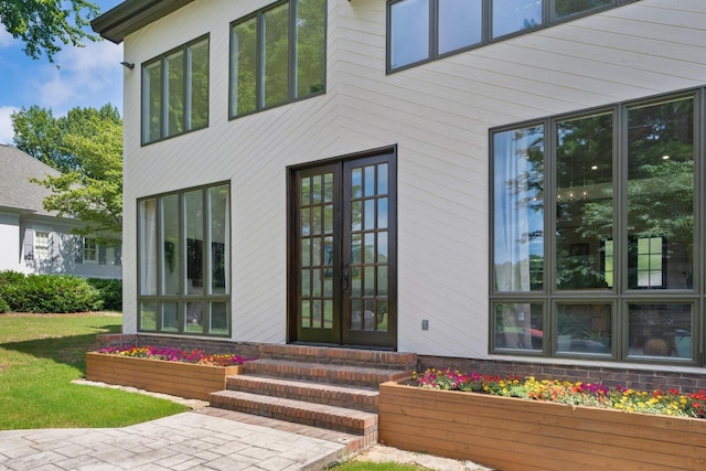 9208 Windstone Dr, Ooltewah, TN 37363 - entrance to property featuring french doors and a lawn