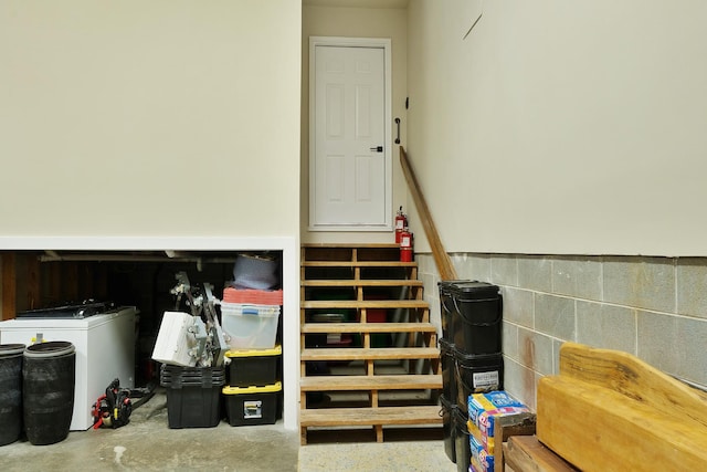 9208 Windstone Dr, Ooltewah, TN 37363 - stairway with concrete flooring and washer / clothes dryer