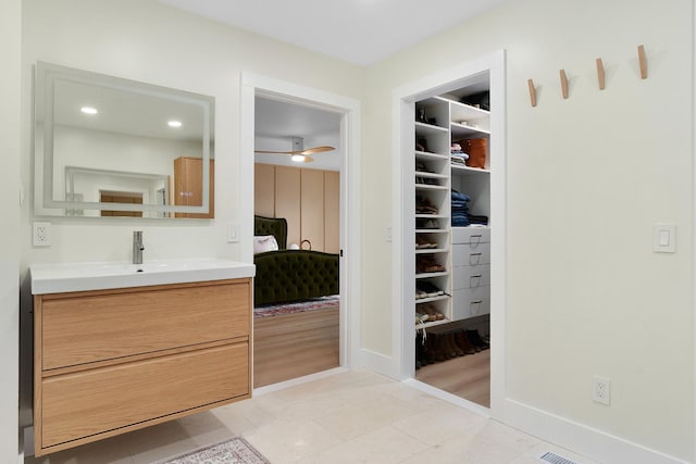 9208 Windstone Dr, Ooltewah, TN 37363 - full bath featuring vanity, ensuite bath, ceiling fan, a spacious closet, and recessed lighting