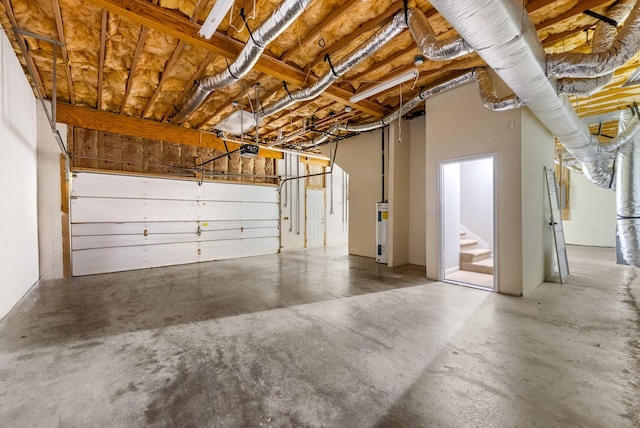 3366 N Henderson Way, Clarksville, TN 37042 - garage featuring a garage door opener and electric water heater