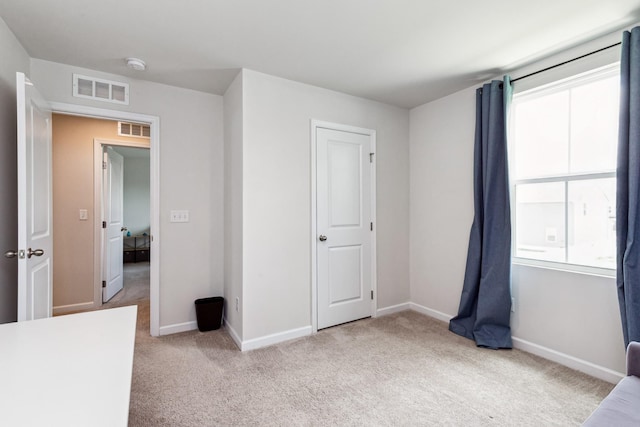 1802 Quail Run Way, Spring Hill, TN 37174 - unfurnished bedroom featuring light carpet
