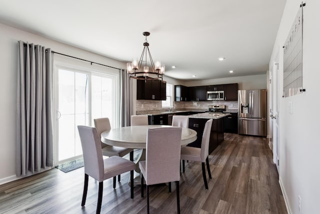 1802 Quail Run Way, Spring Hill, TN 37174 - dining space featuring a chandelier, dark wood-style floors, and recessed lighting