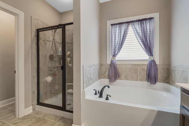 1640 Drayton Dr, Murfreesboro, TN 37130 - bathroom with a garden tub, a stall shower, and tile patterned floors