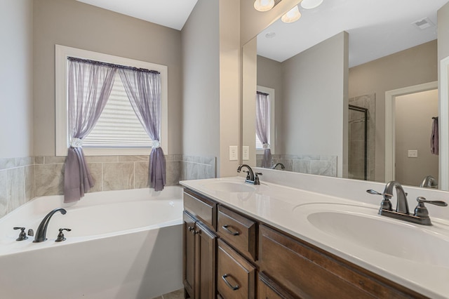 1640 Drayton Dr, Murfreesboro, TN 37130 - bathroom featuring a garden tub, double vanity, and tiled shower