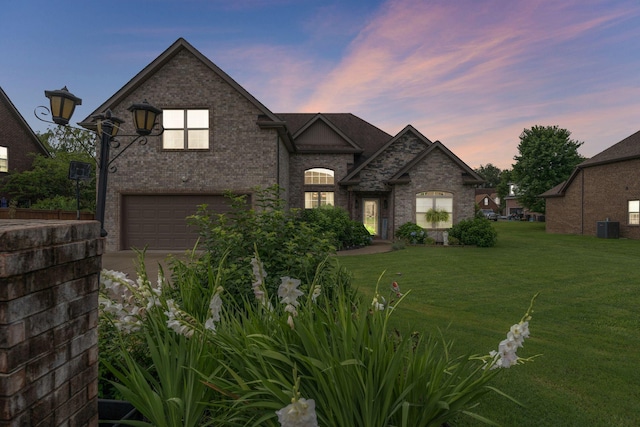 1640 Drayton Dr, Murfreesboro, TN 37130 - french provincial home featuring a garage, a front lawn, brick siding, and concrete driveway