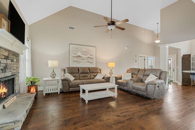 1640 Drayton Dr, Murfreesboro, TN 37130 - living room with high vaulted ceiling, ceiling fan, a stone fireplace, and dark wood-style floors