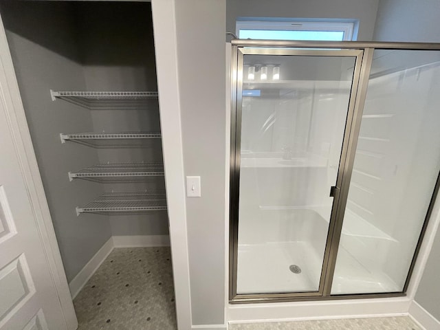 2618 Unitas Dr, Murfreesboro, TN 37129 - bathroom with baseboards and a shower stall