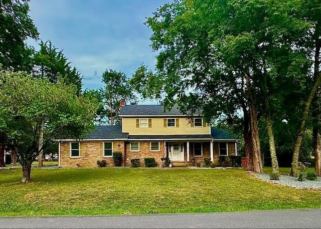 2422 Choctaw Trce, Murfreesboro, TN 37129 - view of front of property with covered porch, a front lawn, and a chimney