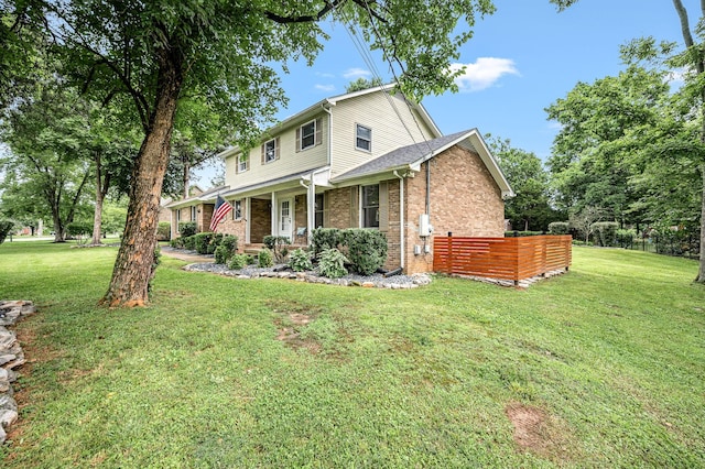 2422 Choctaw Trce, Murfreesboro, TN 37129 - traditional-style home with brick siding, a porch, and a front lawn
