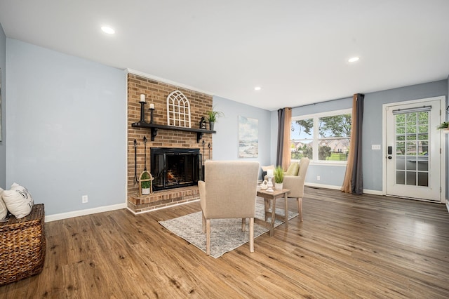 2422 Choctaw Trce, Murfreesboro, TN 37129 - living room with wood finished floors, a brick fireplace, and recessed lighting