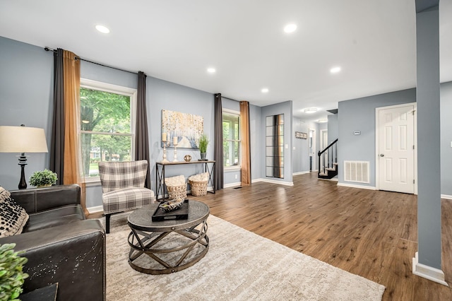 2422 Choctaw Trce, Murfreesboro, TN 37129 - living room with wood finished floors, healthy amount of natural light, stairs, and recessed lighting
