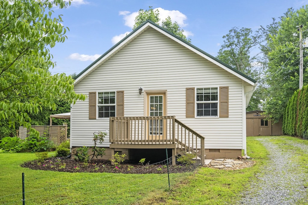 10567 Owens Chapel Rd, Springfield, TN 37172 - back of property featuring a yard, a shed, crawl space, and driveway