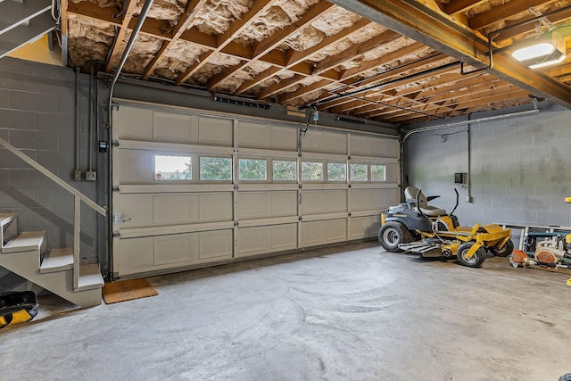 40 Lakeview Trl, Mcminnville, TN 37110 - garage with concrete block wall and a garage door opener