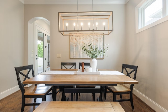 1202 Jewell Ave, Franklin, TN 37064 - dining area featuring arched walkways and wood finished floors