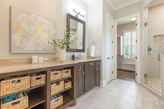 1202 Jewell Ave, Franklin, TN 37064 - bathroom featuring a stall shower, vanity, and ornamental molding