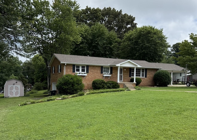 305 E Overhill Dr, Dickson, TN 37055 - ranch-style home featuring brick siding, a storage shed, a front yard, and a garage
