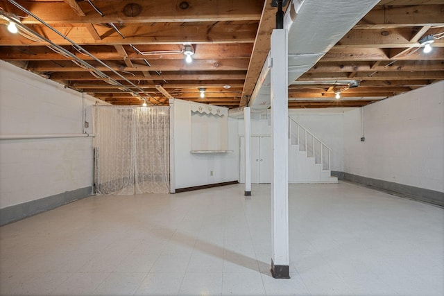 305 E Overhill Dr, Dickson, TN 37055 - unfinished below grade area featuring stairs and baseboards