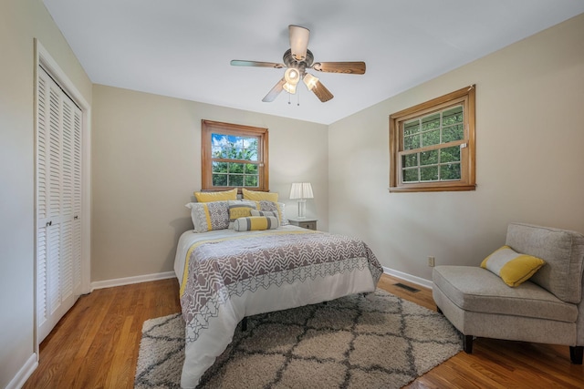 305 E Overhill Dr, Dickson, TN 37055 - bedroom with a closet, wood finished floors, and a ceiling fan