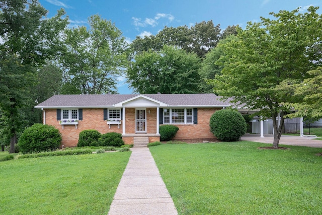 305 E Overhill Dr, Dickson, TN 37055 - ranch-style home with brick siding and roof with shingles