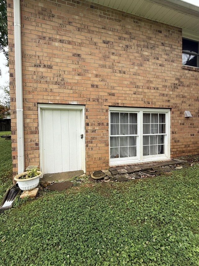 305 E Overhill Dr, Dickson, TN 37055 - doorway to property featuring brick siding
