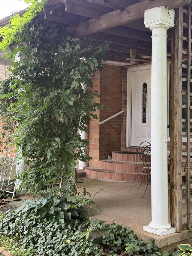 305 E Overhill Dr, Dickson, TN 37055 - property entrance featuring brick siding and covered porch