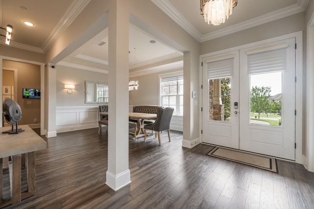 9488 Stillbrook Trce, Brentwood, TN 37027 - entrance foyer with a chandelier, french doors, dark wood-type flooring, crown molding, and a decorative wall