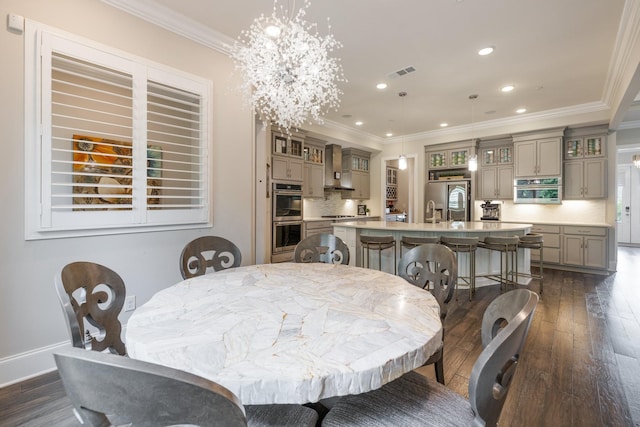 9488 Stillbrook Trce, Brentwood, TN 37027 - dining room with ornamental molding, dark wood-style flooring, recessed lighting, and a chandelier