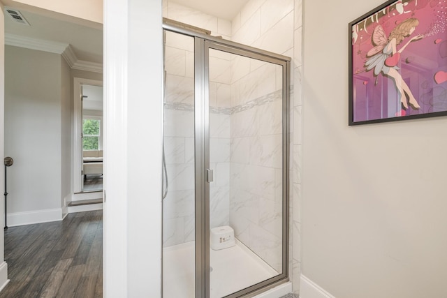 9488 Stillbrook Trce, Brentwood, TN 37027 - full bath featuring crown molding, a stall shower, and wood finished floors