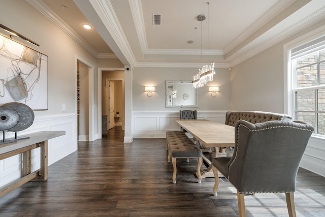 9488 Stillbrook Trce, Brentwood, TN 37027 - dining area with dark wood-style floors, crown molding, a wainscoted wall, a chandelier, and a decorative wall