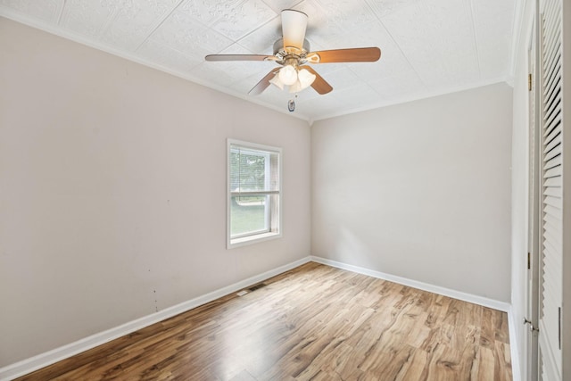 631 W Maple St, Morrison, TN 37357 - empty room featuring ornamental molding, wood finished floors, and a ceiling fan