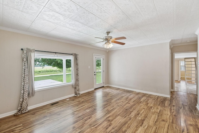 631 W Maple St, Morrison, TN 37357 - unfurnished room featuring ornamental molding, wood finished floors, and ceiling fan