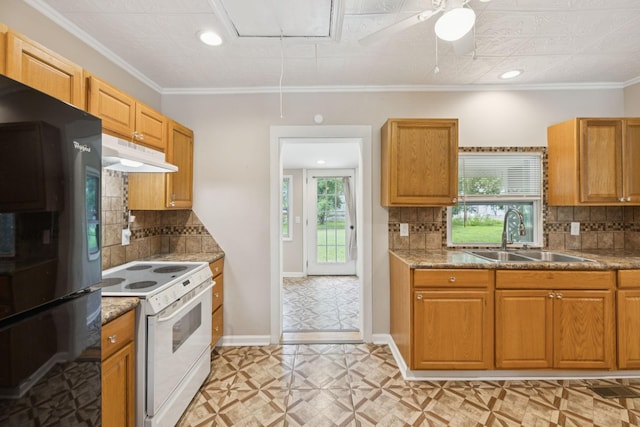 631 W Maple St, Morrison, TN 37357 - kitchen with freestanding refrigerator, white range with electric stovetop, under cabinet range hood, recessed lighting, and backsplash