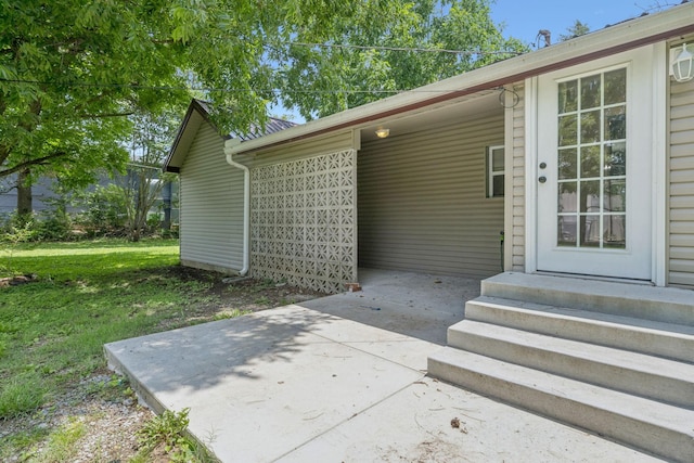 631 W Maple St, Morrison, TN 37357 - doorway to property featuring a yard and a patio area