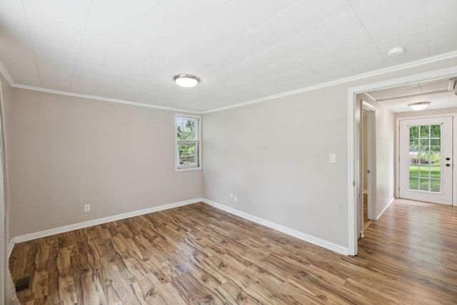 631 W Maple St, Morrison, TN 37357 - empty room featuring wood finished floors, ornamental molding, and a smoke detector
