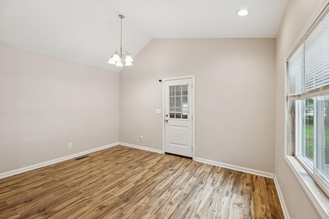 631 W Maple St, Morrison, TN 37357 - spare room with a chandelier, wood finished floors, lofted ceiling, and recessed lighting