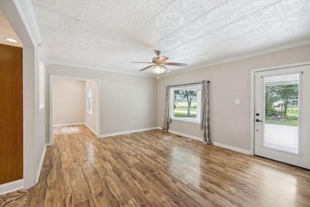 631 W Maple St, Morrison, TN 37357 - unfurnished living room with wood finished floors, ornamental molding, and a ceiling fan