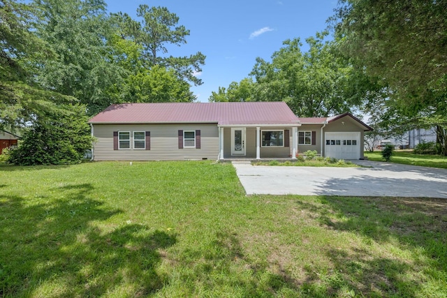 631 W Maple St, Morrison, TN 37357 - single story home with a garage, driveway, a front yard, and a metal roof