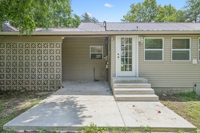 631 W Maple St, Morrison, TN 37357 - doorway to property with a metal roof