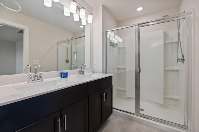858 Longleaf Ln, Columbia, TN 38401 - bathroom featuring a stall shower, double vanity, tile patterned flooring, and recessed lighting