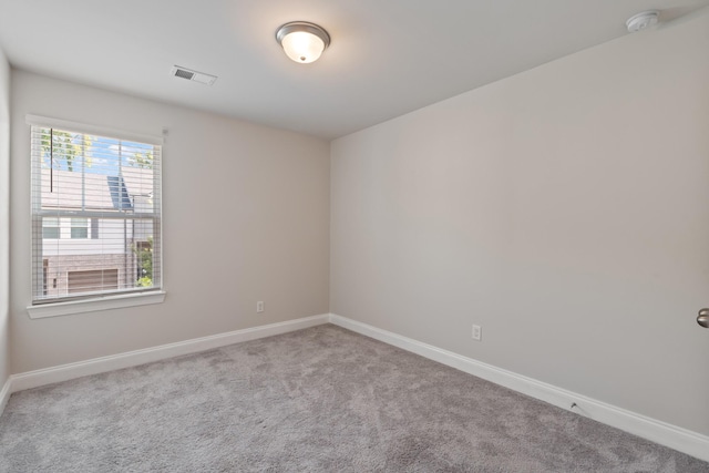 858 Longleaf Ln, Columbia, TN 38401 - carpeted empty room with a smoke detector and baseboards