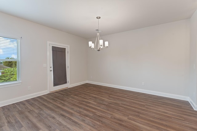 858 Longleaf Ln, Columbia, TN 38401 - unfurnished room featuring a chandelier and dark wood-style flooring