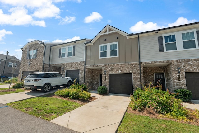 858 Longleaf Ln, Columbia, TN 38401 - multi unit property featuring an attached garage, concrete driveway, board and batten siding, and brick siding