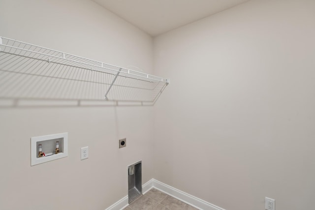 858 Longleaf Ln, Columbia, TN 38401 - washroom with electric dryer hookup, hookup for a washing machine, and light tile patterned flooring