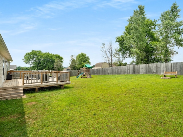 1908 Sheffield Ln, Columbia, TN 38401 - fenced backyard featuring a wooden deck and a playground