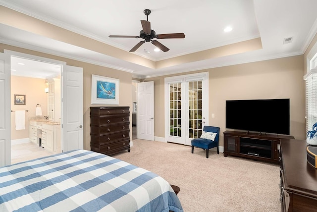 241 King Arthur Cir, Franklin, TN 37067 - bedroom featuring a tray ceiling, crown molding, light carpet, connected bathroom, and a ceiling fan