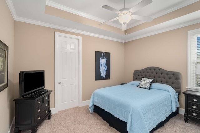 241 King Arthur Cir, Franklin, TN 37067 - bedroom featuring a tray ceiling, light colored carpet, ornamental molding, and a ceiling fan